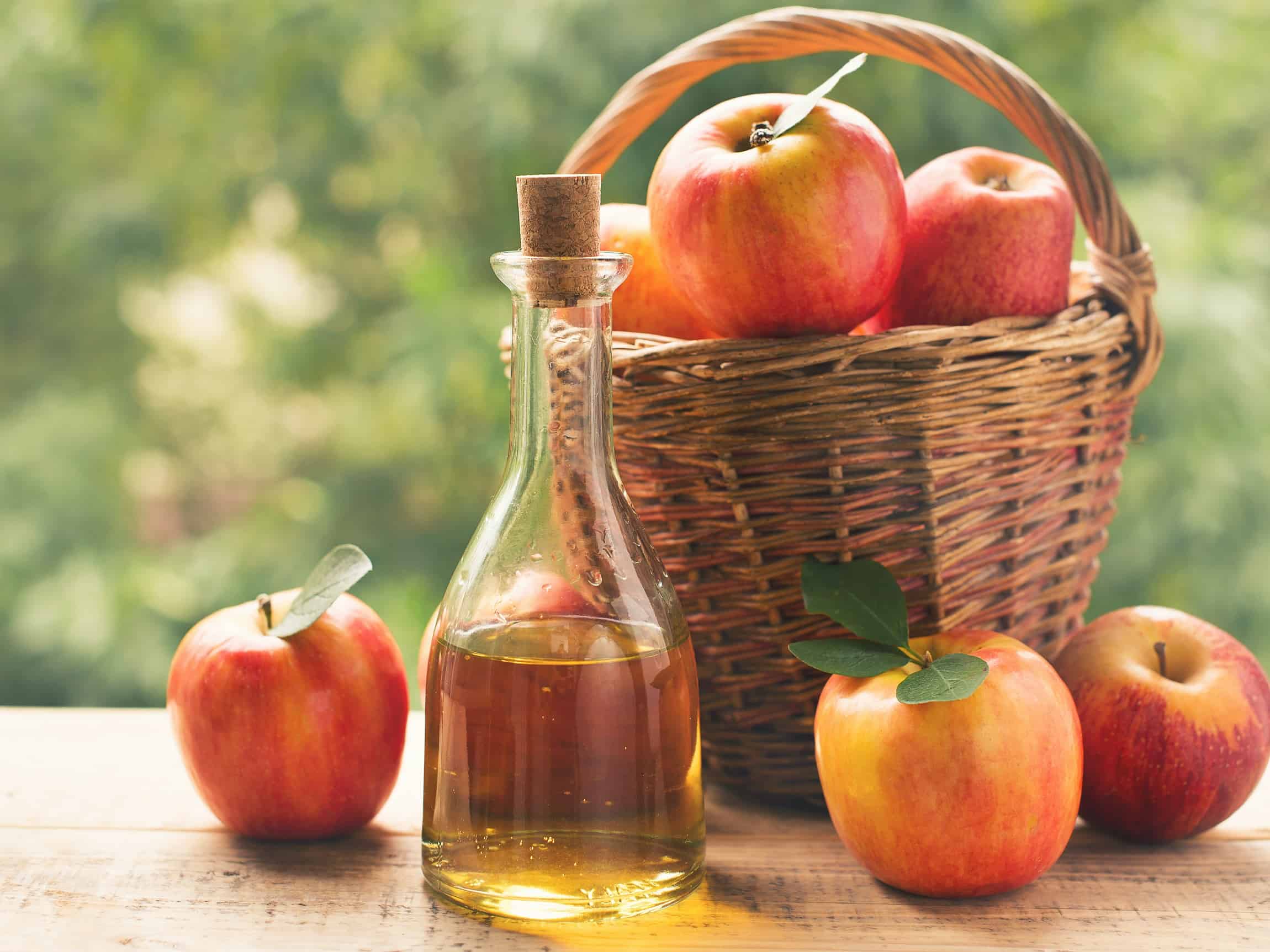 How does apple cider vinegar help with hair and scalp care?